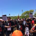 Assistant general secretary Kemal Özkan speaks to crowd at rally against Rio Tinto