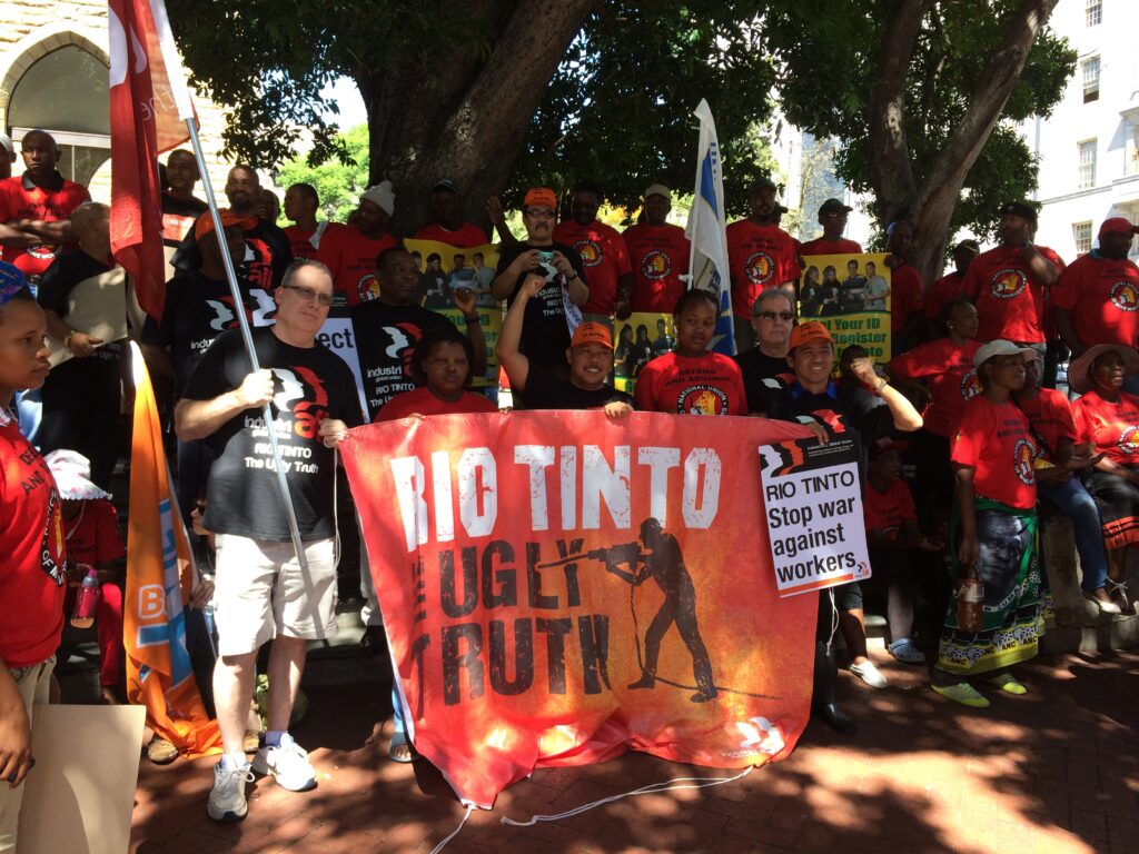 Demonstraters gathering before rally against Rio Tinto