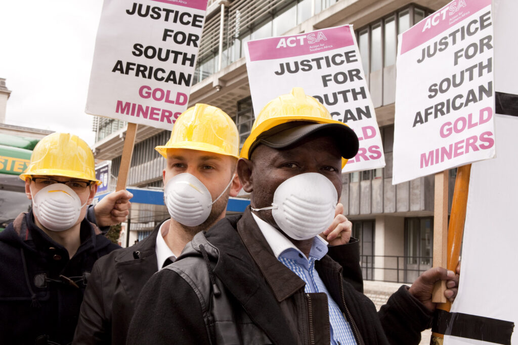 Activists protest against Rio Tinto and Anglo American at their Annual General Meeting, April 2013. Amy Scaife/ London Mining Network