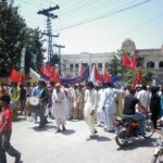 Le rassemblement trabersant l'Université de Gujrat, le 7 Octobre 2014