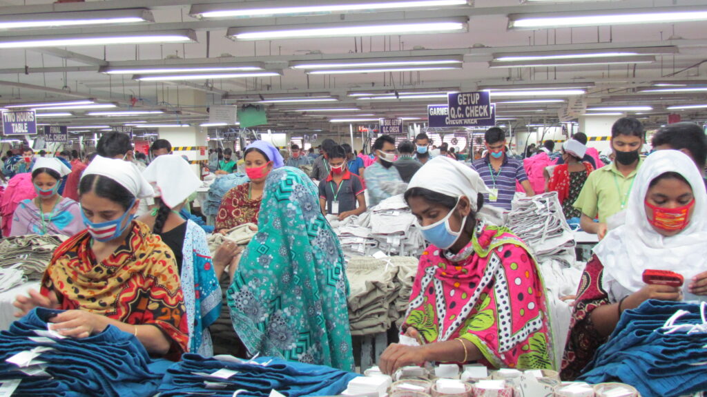 Workers in a garment factory in Dhaka, part of a winding supply chain. 