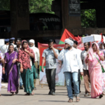 Лакан Саху, оргсекретарь PCSS возглавляет шествие 1 июля 2015 г.